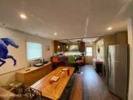 3518 E Beach Drive, Oak Island, NC 28465 — 3-bedroom waterfront home in E. Long Beach, Oak Island, NC, photo 10 of 39: IMG_4296