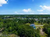 232 1009 Kings Creek Crossing, Holly Ridge, NC 28445 — waterfront lot in Summerhouse On Everett Bay, Holly Ridge, NC, photo 19 of 30: Lot 1009-232 Kings Creek Crossing MLS-22