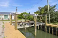 100 E Bogue Sound Drive, Atlantic Beach, NC 28512 — 4-bedroom waterfront home, Atlantic Beach, NC, photo 3 of 52: Boat Lifts