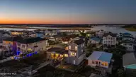 5419 W Beach Drive, Oak Island, NC 28465 — 7-bedroom waterfront home, Oak Island, NC, photo 8 of 69: 9_twilight