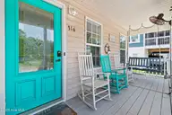 316 NE 52nd Street, Oak Island, NC 28465 — 3-bedroom home in Tranquil Harbor, Oak Island, NC, photo 3 of 49: 11_front entryway