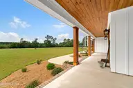 107 Mayflower Drive, Newport, NC 28570 — 3-bedroom home in Chadwick Shores Plantation, Newport, NC, photo 4 of 60: Covered front porch