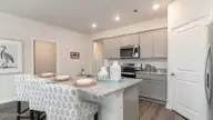1205 Woodhouse Drive NW, Ash, NC 28420 — 4-bedroom home in Brunswick Plantation, Ash, NC, photo 6 of 31: Dover Interior 12