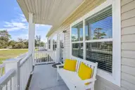 204 Nelson Street, Harkers Island, NC 28531 — 3-bedroom home in Earl Davis, Harkers Island, NC, photo 5 of 52: Front Porch