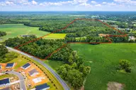 38.77 Ac Hickman Road NW, Calabash, NC 28467 — lot in Hickmans Crossing, Calabash, NC, photo 2 of 8: ChatGPT Image Jan 6, 2026, 08_58_13 AM