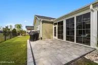 8849 Nashville Drive NW, Calabash, NC 28467 — 4-bedroom home in Brunswick Plantation, Calabash, NC, photo 23 of 51: Patio