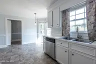 106 Duchess Drive, Winterville, NC 28590 — 3-bedroom home in Windsor, Winterville, NC, photo 23 of 46: kitchen with stainless steel appliances