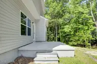 888 Billys Dream Circle SW, Supply, NC 28462 — 4-bedroom home in Ruffin's River Lndg, Supply, NC, photo 4 of 26: back.2