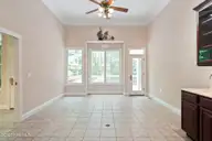 86 Plantation Passage Drive SE, Bolivia, NC 28422 — 4-bedroom waterfront home in Winding River Plantation, Bolivia, NC, photo 7 of 77: Living Room