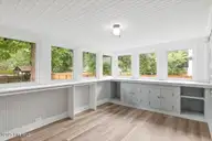 205 Forest Hill Avenue, Rocky Mount, NC 27804 — 3-bedroom home, Rocky Mount, NC, photo 24 of 43: Sunroom off of Primary Bedroom