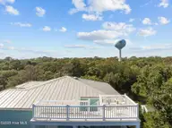 110 Camp Wyatt Court, Kure Beach, NC 28449 — 5-bedroom home in Ocean Dunes Forest, Kure Beach, NC, photo 7 of 74: 12-web-or-mls-DJI_20251002121839_0394_D