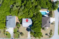 129 Indigo Drive, Emerald Isle, NC 28594 — 3-bedroom home in Bluewater Bay, Emerald Isle, NC, photo 7 of 29: Aerial