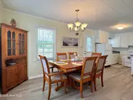 2000 Harbor Drive SW, Ocean Isle Beach, NC 28469 — 3-bedroom waterfront home in Marlee Acres, Ocean Isle Beach, NC, photo 13 of 27: Dining Room