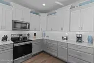 4321 E Beach Drive, Oak Island, NC 28465 — 6-bedroom waterfront home in E. Long Beach, Oak Island, NC, photo 13 of 49: 31-web-or-mls-BTS01995
