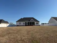 511 Heron Drive, Goldsboro, NC 27534 — 3-bedroom home in Heron Creek, Goldsboro, NC, photo 14 of 34: back yard from fence