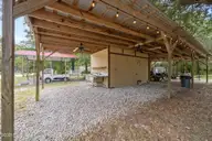 618 Creek Drive, Hampstead, NC 28443 — 3-bedroom manufactured home in Cedar Landing, Hampstead, NC, photo 12 of 51: SHED WITH PIZAZZ