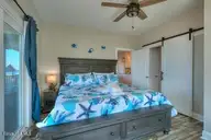 5103 W Beach Drive, Oak Island, NC 28465 — 4-bedroom waterfront home in W. Long Beach, Oak Island, NC, photo 23 of 65: 5103 W Beach Drive 22