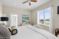 516 Blue Heron Drive, Newport, NC 28570 — 3-bedroom waterfront home in Blue Heron Bay, Newport, NC, photo 23 of 62: Primary suite with sound views