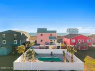 5518 E Beach Drive, Oak Island, NC 28465 — 5-bedroom waterfront home in E. Long Beach, Oak Island, NC, photo 2 of 55: 5518 E Beach Drive 1