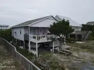 3518 E Beach Drive, Oak Island, NC 28465 — 3-bedroom waterfront home in E. Long Beach, Oak Island, NC, photo 2 of 39: DJI_0266