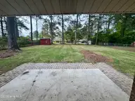 1311 Briarwood Drive NW, Wilson, NC 27896 — 3-bedroom home in Edgewood, Wilson, NC, photo 5 of 25: Backyard Patio