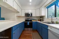 142 Lagoon Lane, Pine Knoll Shores, NC 28512 — 3-bedroom waterfront condo in Mcginnis Point, Pine Knoll Shores, NC, photo 12 of 41: Updated Kitchen