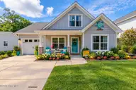 129 NE 13th Street, Oak Island, NC 28465 — 3-bedroom home, Oak Island, NC, photo 1 of 68: 1 Street View AI Generated