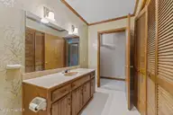 311 Lord Granville Drive, Morehead City, NC 28557 — 3-bedroom home in Brandywine Bay, Morehead City, NC, photo 24 of 53: Hall Bathroom