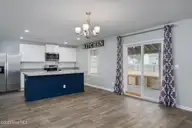 67 Fresh Air Drive, Hampstead, NC 28443 — 3-bedroom home in Hope Creek, Hampstead, NC, photo 10 of 45: Large, open kitchen