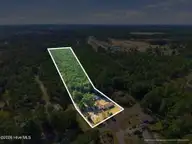 881 Village Point Road SW, Shallotte, NC 28470 — lot, Shallotte, NC, photo 1 of 17: 17-web-or-mls-DJI_20260930151056_0341_D-