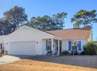 5228 Minnesota Drive SE, Southport, NC 28461 — 3-bedroom home in South Harbour Village, Southport, NC, photo 1 of 52: Street view