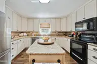 2009 Johnson Road, Elizabeth City, NC 27909 — 3-bedroom home in Hickory Acres, Elizabeth City, NC, photo 19 of 49: Kitchen