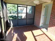 2705 N Main Street, Tarboro, NC 27886 — 3-bedroom home in Belvedere, Tarboro, NC, photo 15 of 36: Enclosed Sun Porch