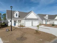214 Sandpiper Place, Holly Ridge, NC 28445 — 3-bedroom townhome in Coastal Village, Holly Ridge, NC, photo 3 of 21: 212-214 Sandpiper - Exterior - Edited_9