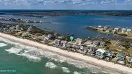701 New River Inlet Road, North Topsail Beach, NC 28460 — 5-bedroom waterfront home in Sea Dunes Village, North Topsail Beach, NC, photo 13 of 29: DJI_20260325135228_0088_D