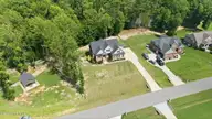 1453 Blue Heron Drive, Nashville, NC 27856 — 3-bedroom waterfront home in The Landing at Cooper Fields, Nashville, NC, photo 10 of 59: 9-web-or-mls-DJI_20260708152504_0588_D