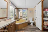 2882 Six Pence Drive SW, Supply, NC 28462 — 2-bedroom waterfront manufactured home in Buccaneer Hills, Supply, NC, photo 16 of 44: 17-web-or-mls-CamMediallc.com-33