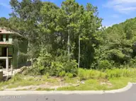 661 Vale Drive, Wilmington, NC 28411 — lot in Marsh Landing Place, Wilmington, NC, photo 9 of 17: 14-web-or-mls-DJI_20260909115312_0570_D