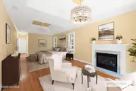 573 Coral Ridge Road, Pine Knoll Shores, NC 28512 — 4-bedroom waterfront home in Beacon's Reach, Pine Knoll Shores, NC, photo 23 of 59: Primary suite