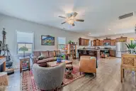107 Village Drive, Holly Ridge, NC 28445 — 4-bedroom home in Coastal Village, Holly Ridge, NC, photo 6 of 77: Living room