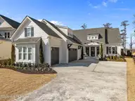 2737 Alvernia Drive, Castle Hayne, NC 28429 — 4-bedroom waterfront home in Sunset Reach, Castle Hayne, NC, photo 1 of 56: 2-web-or-mls-DJI_20260206114032_0067_D