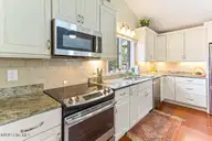 65 Lake Hills Road, Pinehurst, NC 28374 — 2-bedroom home in Unit 6, Pinehurst, NC, photo 19 of 43: Sun filled kitchen