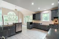 86 Plantation Passage Drive SE, Bolivia, NC 28422 — 4-bedroom waterfront home in Winding River Plantation, Bolivia, NC, photo 11 of 77: Kitchen