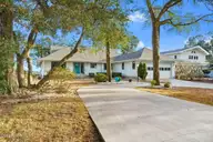 3347 Channelside Drive SW, Supply, NC 28462 — 3-bedroom waterfront home in Lockwood Folly, Supply, NC, photo 1 of 77: 3347 Channelside Drive