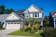 4058 Druids Glen Drive, Leland, NC 28451 — 4-bedroom waterfront home in Brunswick Forest, Leland, NC, photo 1 of 55