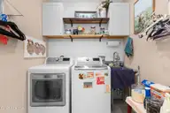 1310 Grandiflora Drive, Leland, NC 28451 — 4-bedroom home in Magnolia Greens, Leland, NC, photo 24 of 56: 51_laundry room