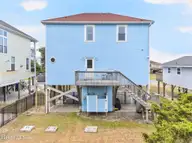 1616 E Dolphin Drive, Oak Island, NC 28465 — 4-bedroom waterfront home in Long Beach, Oak Island, NC, photo 9 of 55: Kahunaphoto.com--13