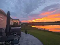 402 Taylorwood Drive, Beaufort, NC 28516 — 5-bedroom waterfront home in Beaufort Club, Beaufort, NC, photo 3 of 50: No Filter - just sunset