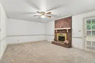 1120 Par Three Drive S, Wilson, NC 27893 — 3-bedroom home in Willow Springs, Wilson, NC, photo 19 of 50: Den 4