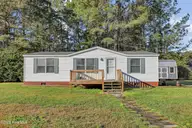 307 Buttonwood Court, Rocky Point, NC 28457 — 3-bedroom manufactured home in Creekwalk @ Bellhammon, Rocky Point, NC, photo 1 of 24